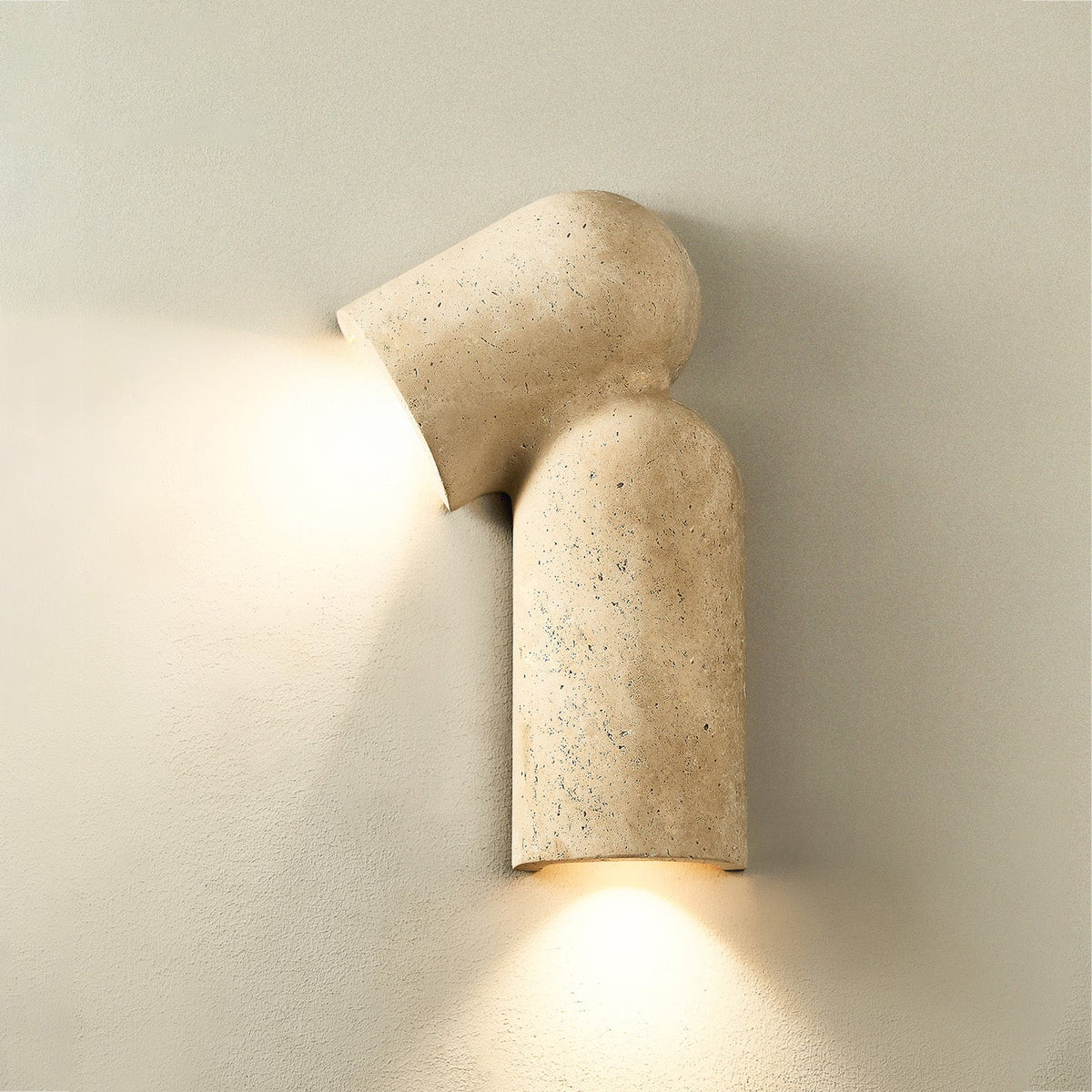 Selvian Sculptural Travertine Wall Sconce for Modern Interiors