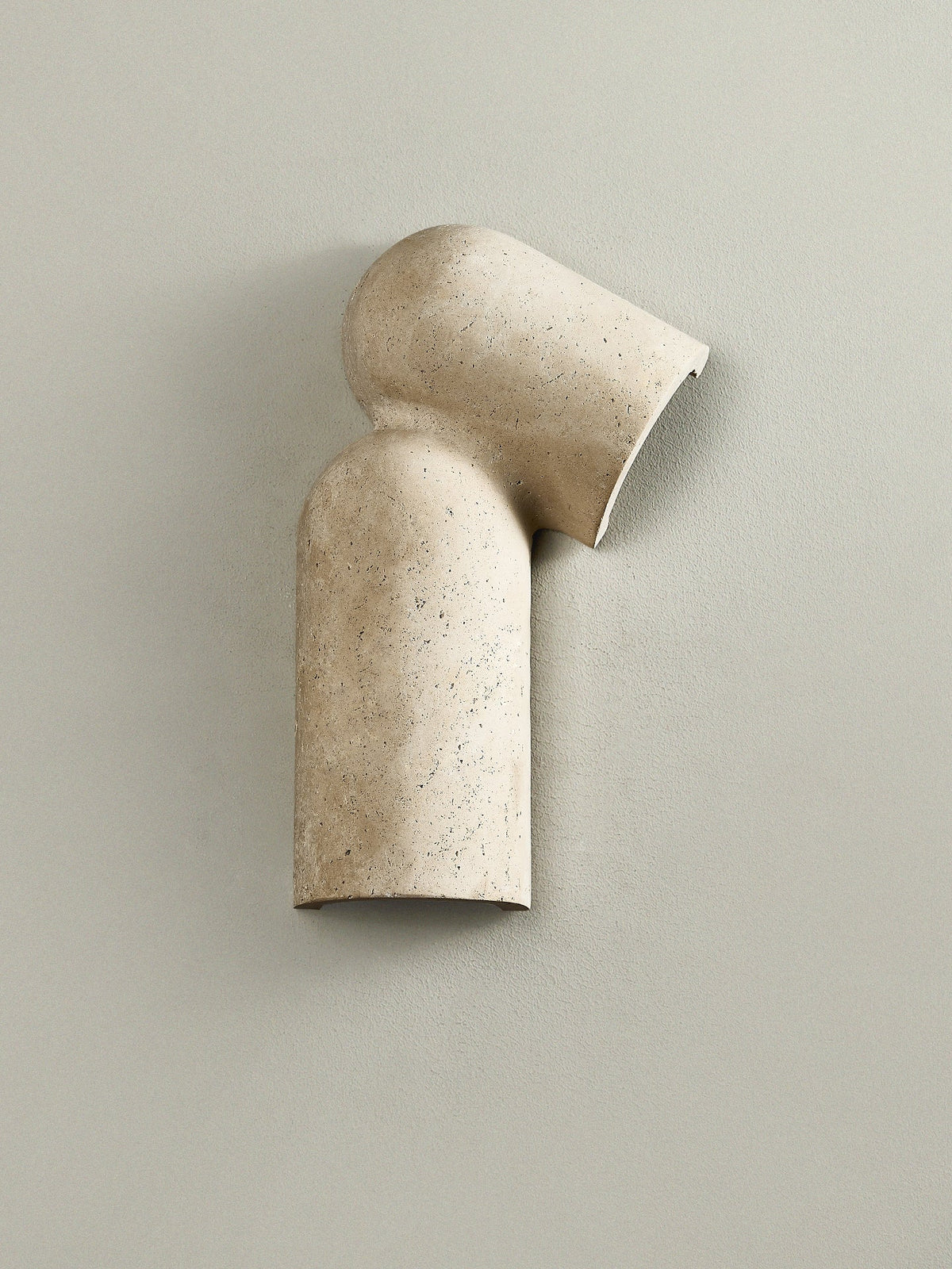 Selvian Sculptural Travertine Wall Sconce for Modern Interiors