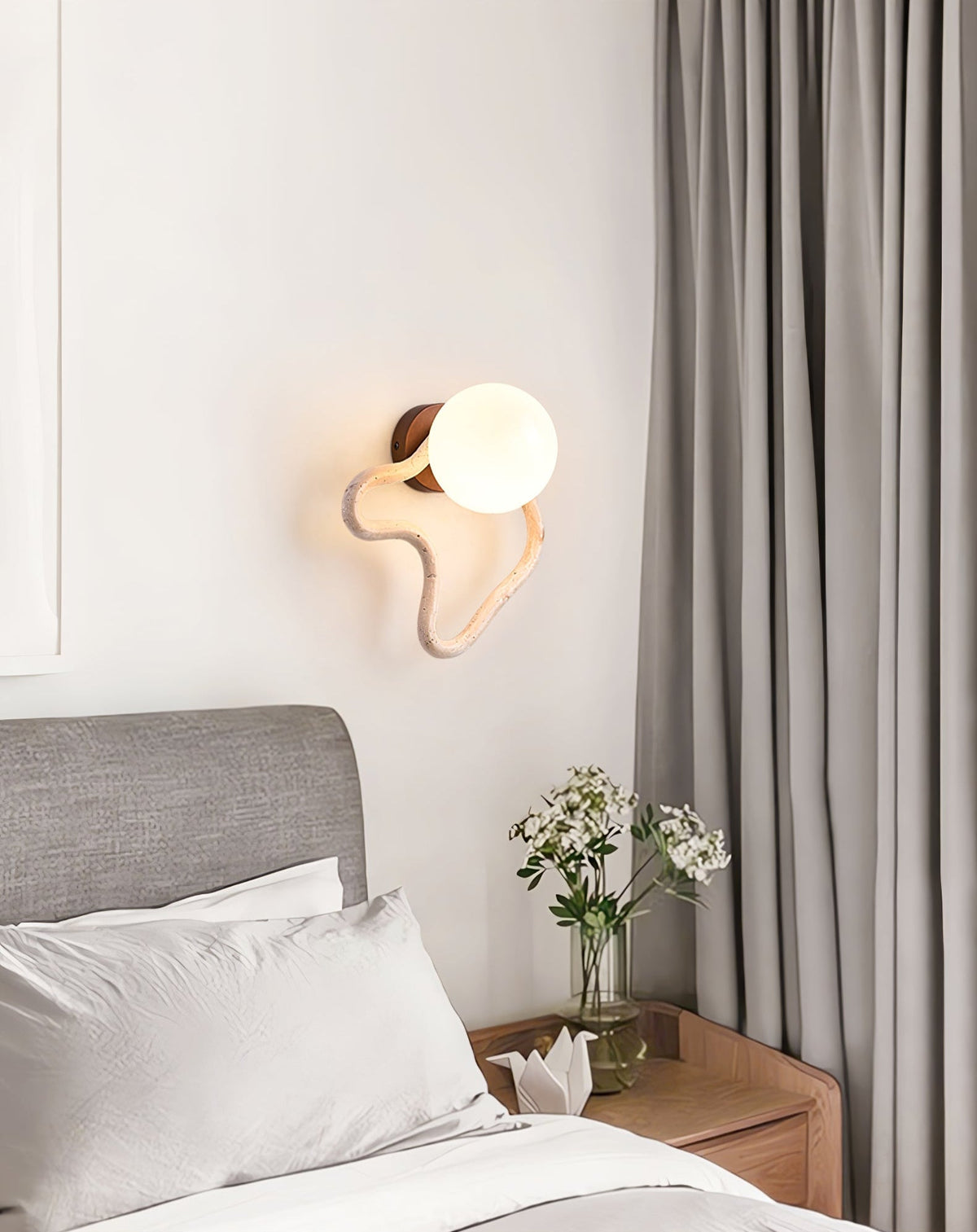 Serpentine Travertine Wall Sconce — Modern Organic Lighting for Hallways & Living Spaces