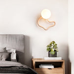 Serpentine Travertine Wall Sconce — Modern Organic Lighting for Hallways & Living Spaces