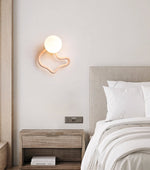 Serpentine Travertine Wall Sconce — Modern Organic Lighting for Hallways & Living Spaces