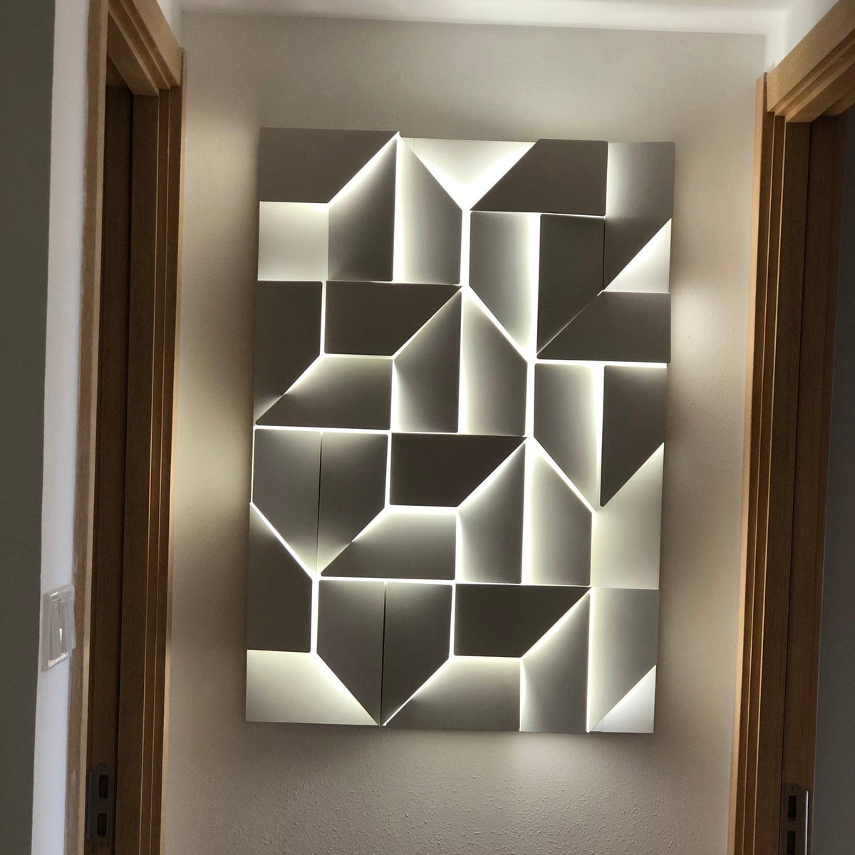 Shadows Charging Grand Sconce