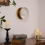 Solar Eclipse Brass Wall Sconce with Glass Shade for Modern Interiors