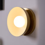 Solar Eclipse Brass Wall Sconce with Glass Shade for Modern Interiors