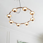 Solara LED Chandelier in Brass and Glass for Modern Interiors