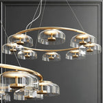 Solara LED Chandelier in Brass and Glass for Modern Interiors