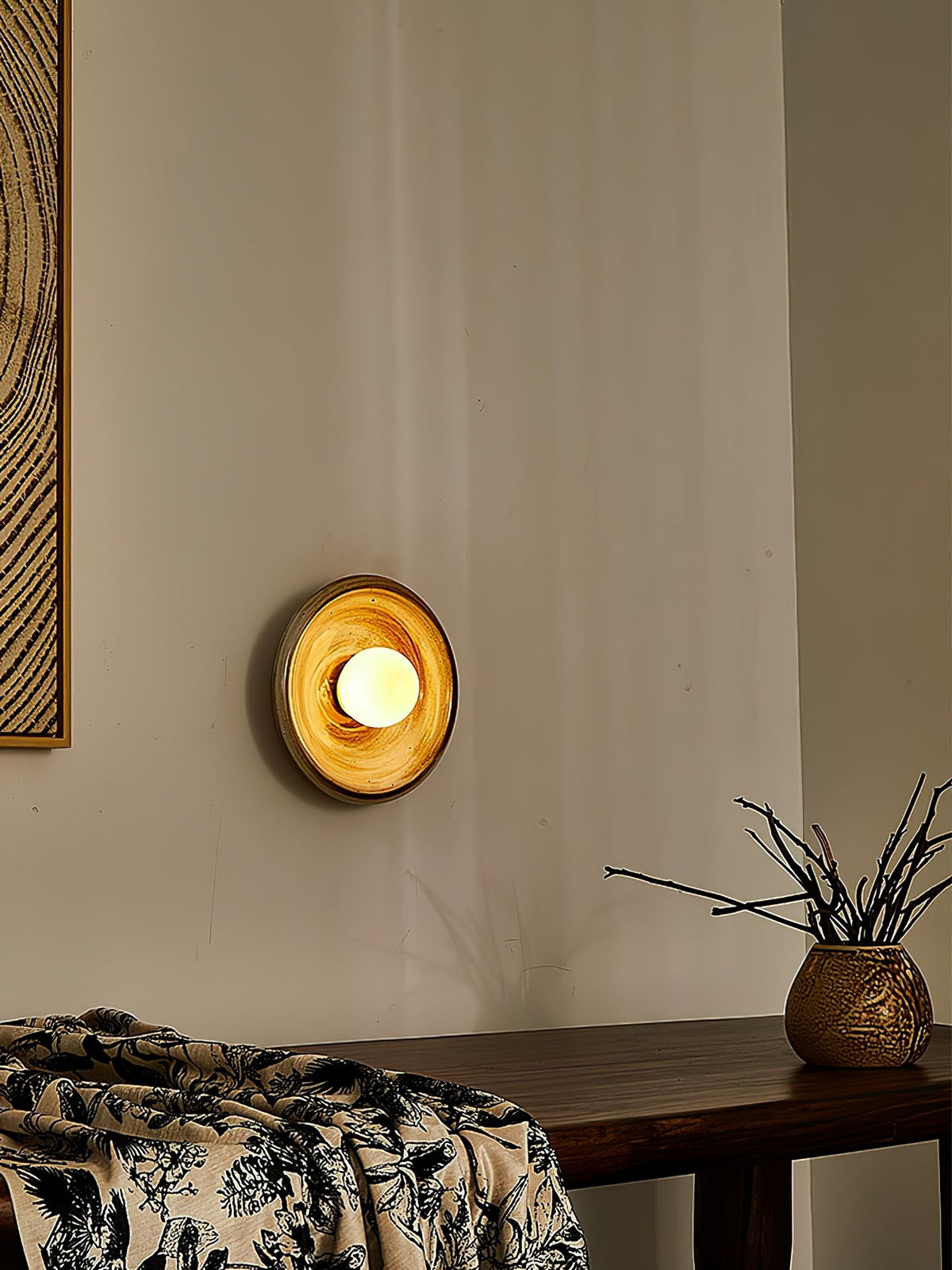 Solstice Swirl Ceramic Wall Sconce with Glowing Orb