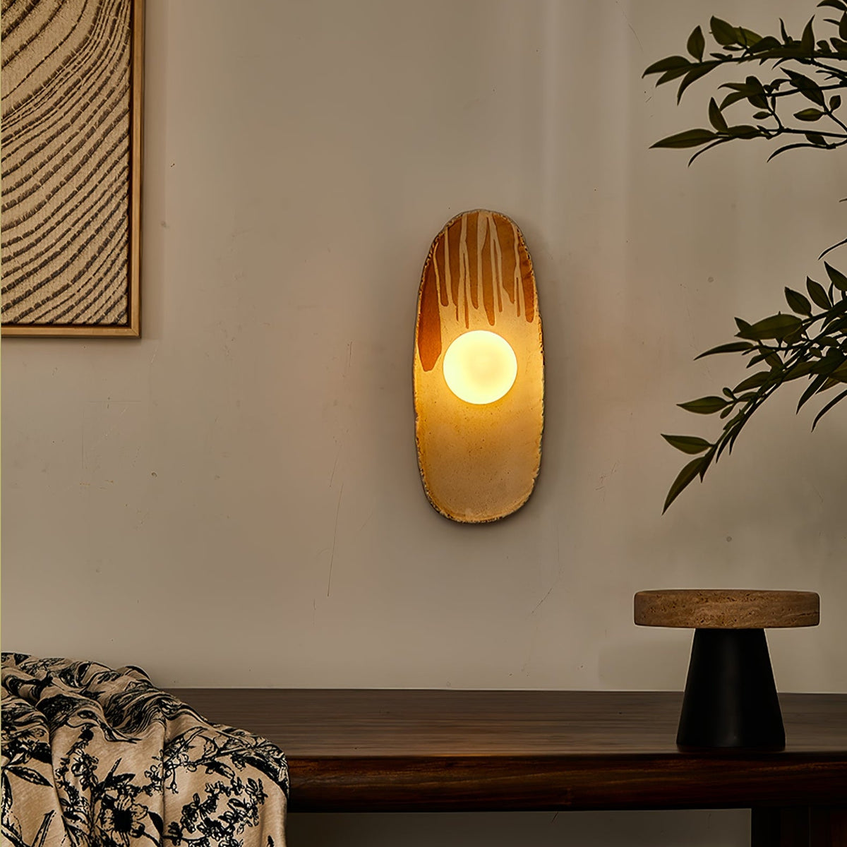 Solstice Swirl Ceramic Wall Sconce with Glowing Orb