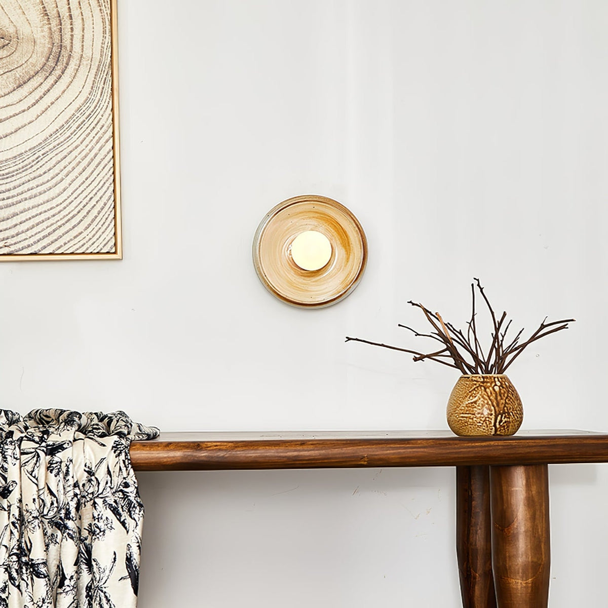 Solstice Swirl Ceramic Wall Sconce with Glowing Orb