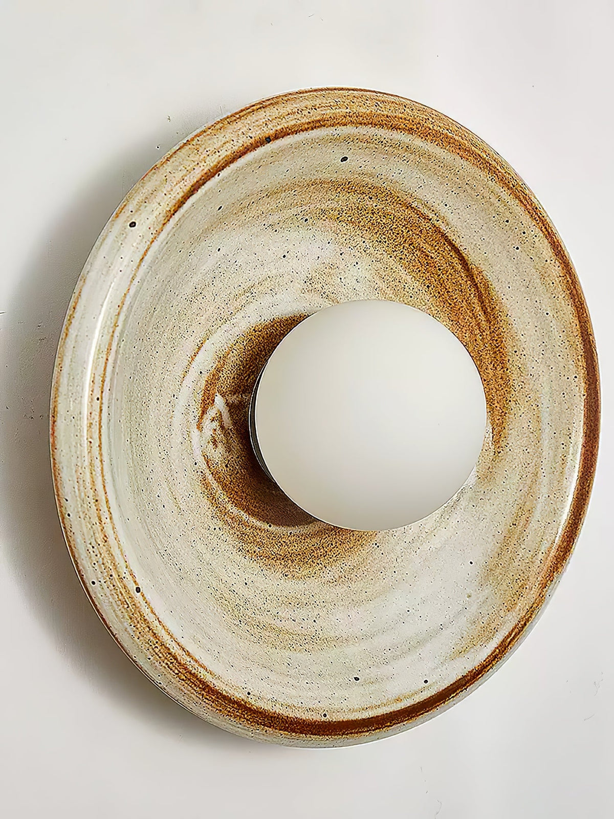 Solstice Swirl Ceramic Wall Sconce with Glowing Orb