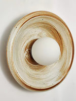 Solstice Swirl Ceramic Wall Sconce with Glowing Orb