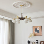 Solviento Modern Brass and Wood Chandelier with Glass Globes