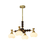 Solviento Modern Brass and Wood Chandelier with Glass Globes