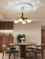 Solviento Modern Brass and Wood Chandelier with Glass Globes