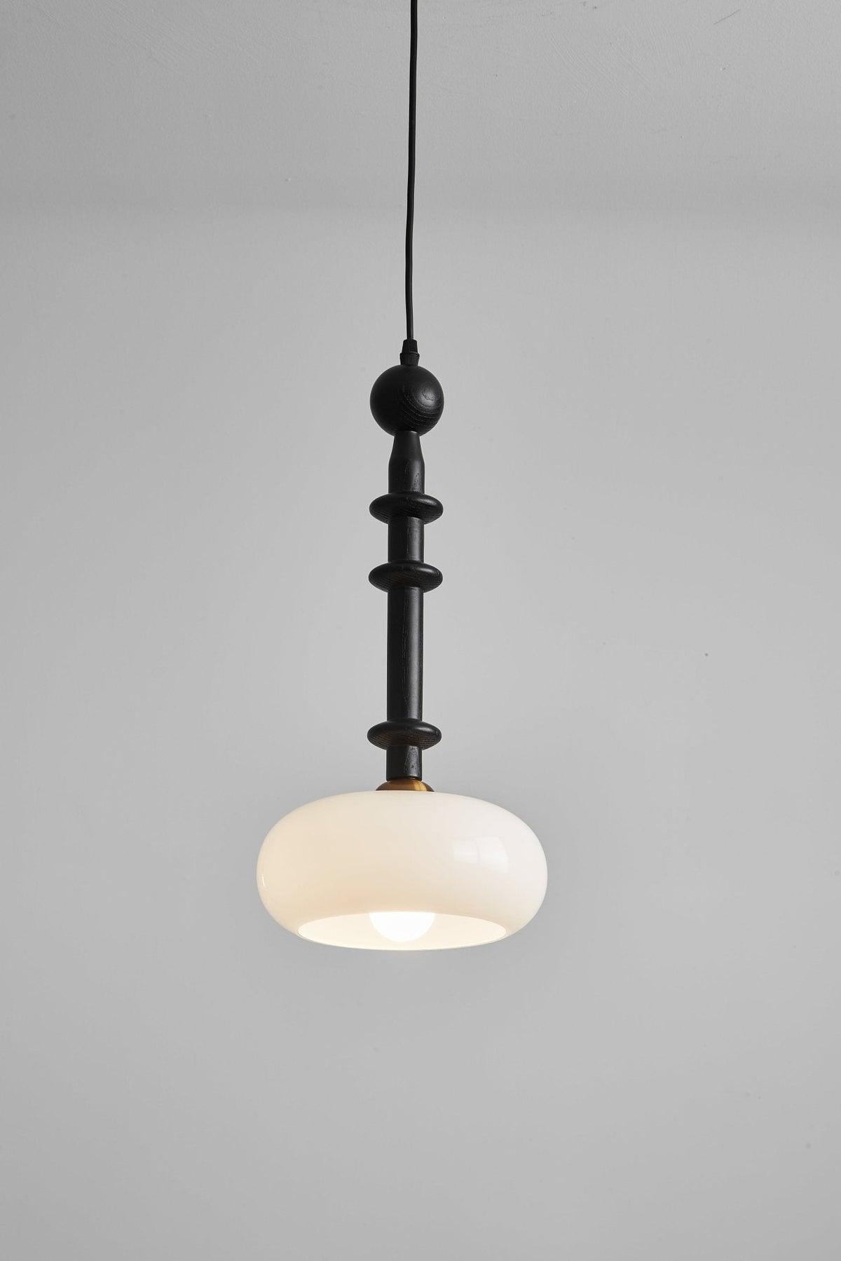 Solvra Modern Wood and Amber Glass Pendant Light for Dining Room