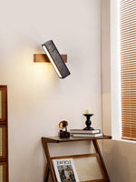 Stellar Pivot Sconce — Black Travertine & Walnut LED Wall Light