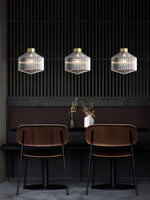 Art Glass Spinning Top Pendant Light in Gold for Dining & Living Spaces