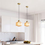 Art Glass Spinning Top Pendant Light in Gold for Dining & Living Spaces