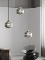 Art Glass Spinning Top Pendant Light in Gold for Dining & Living Spaces