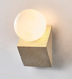 Tavian Orb Travertine Wall Sconce with Glass Globe