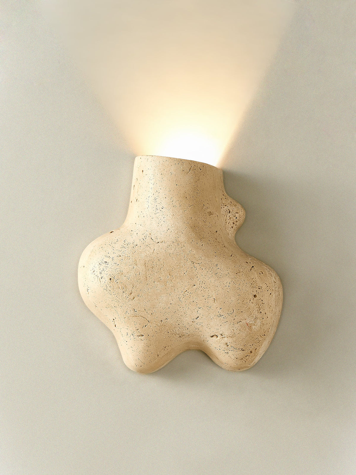 Travertine Abstract Wall Sconce with Warm Ambient Glow