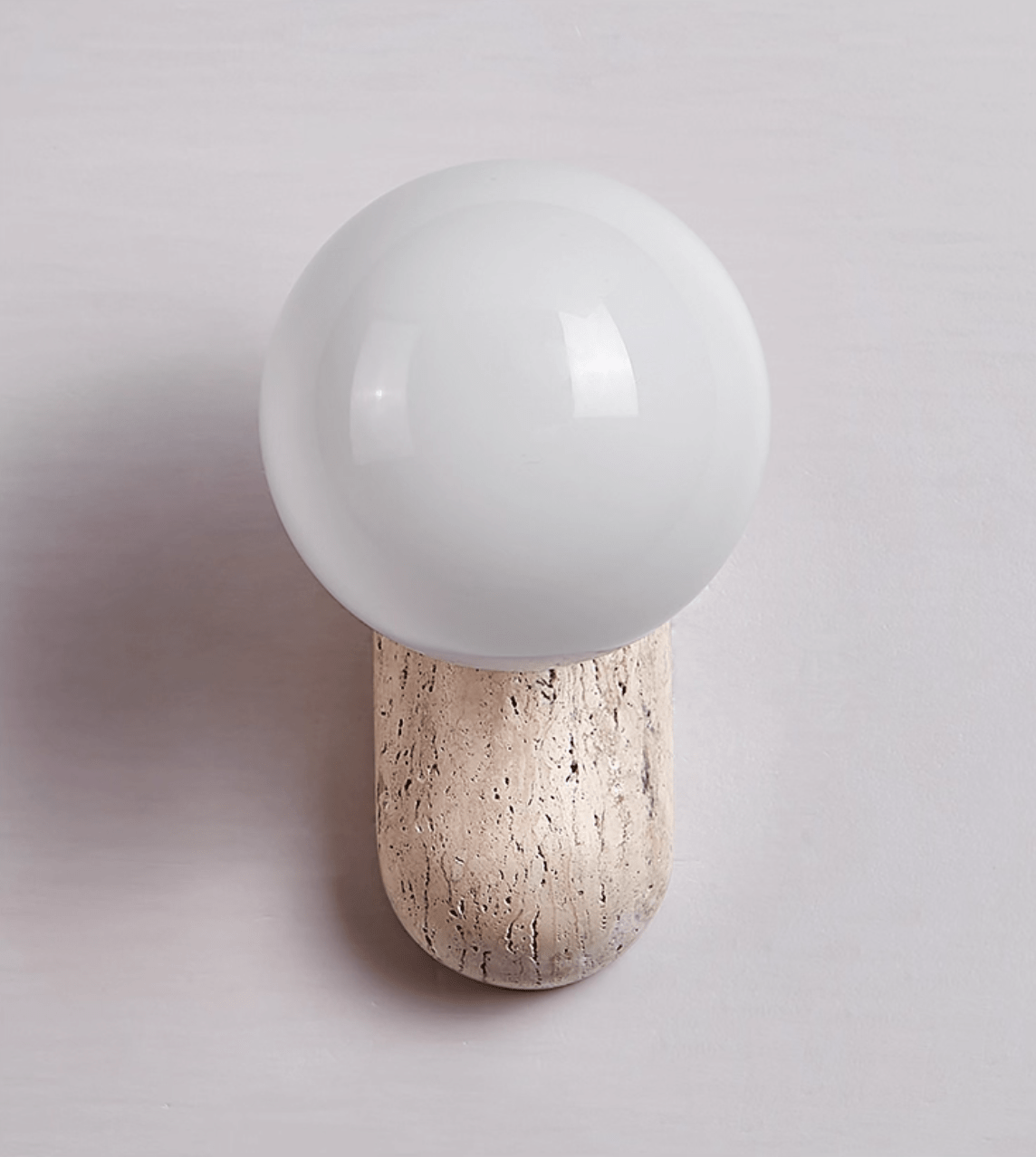 Travertine Pebble Wall Sconce with Opal Glass Globe for Modern Interiors