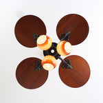 Tropica Breeze Ceiling Fan Light with Palm Blades and Amber Glass