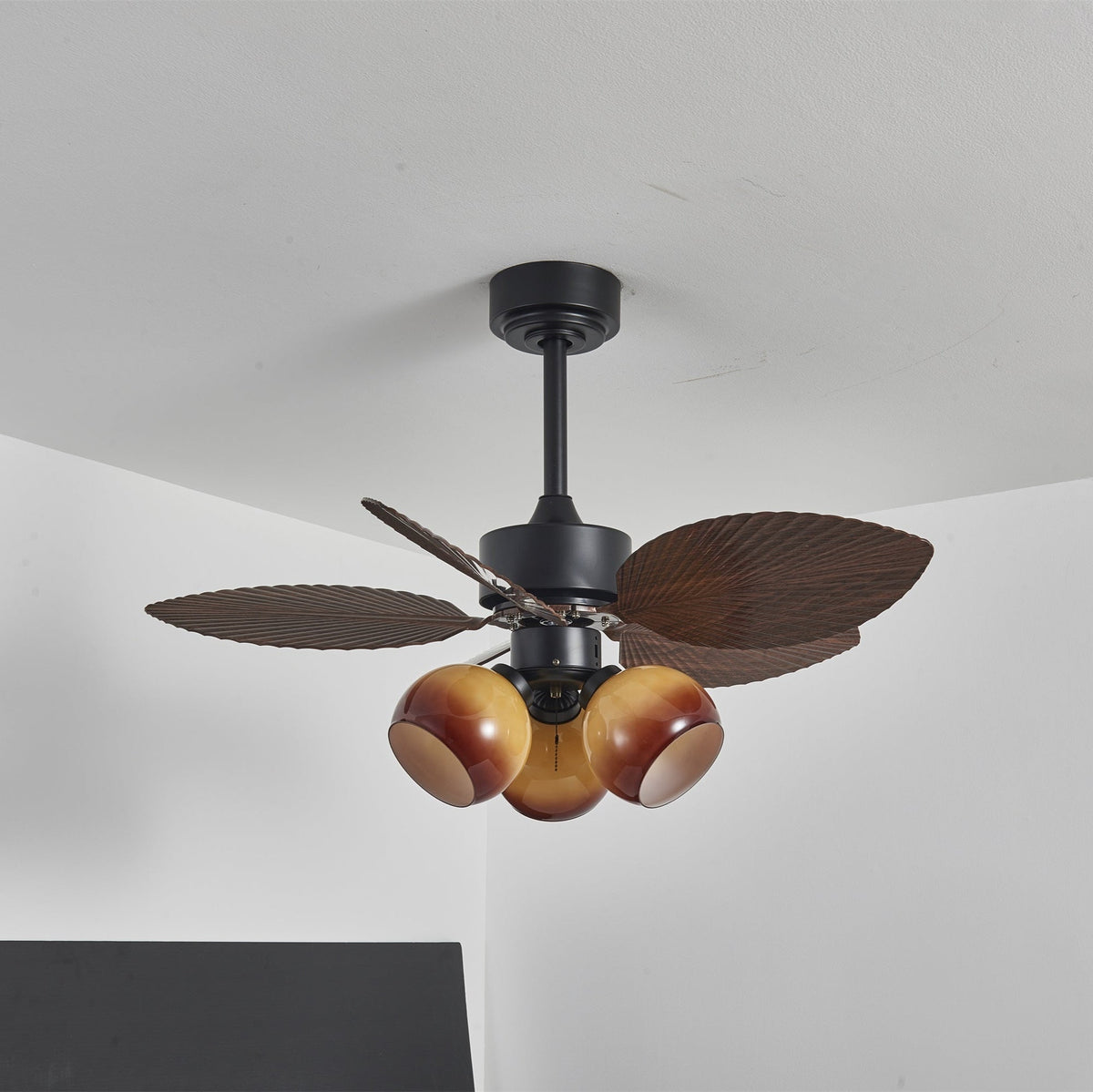Tropiluxe Ceiling Fan Light with Palm Leaf Blades and Amber Glass Shade