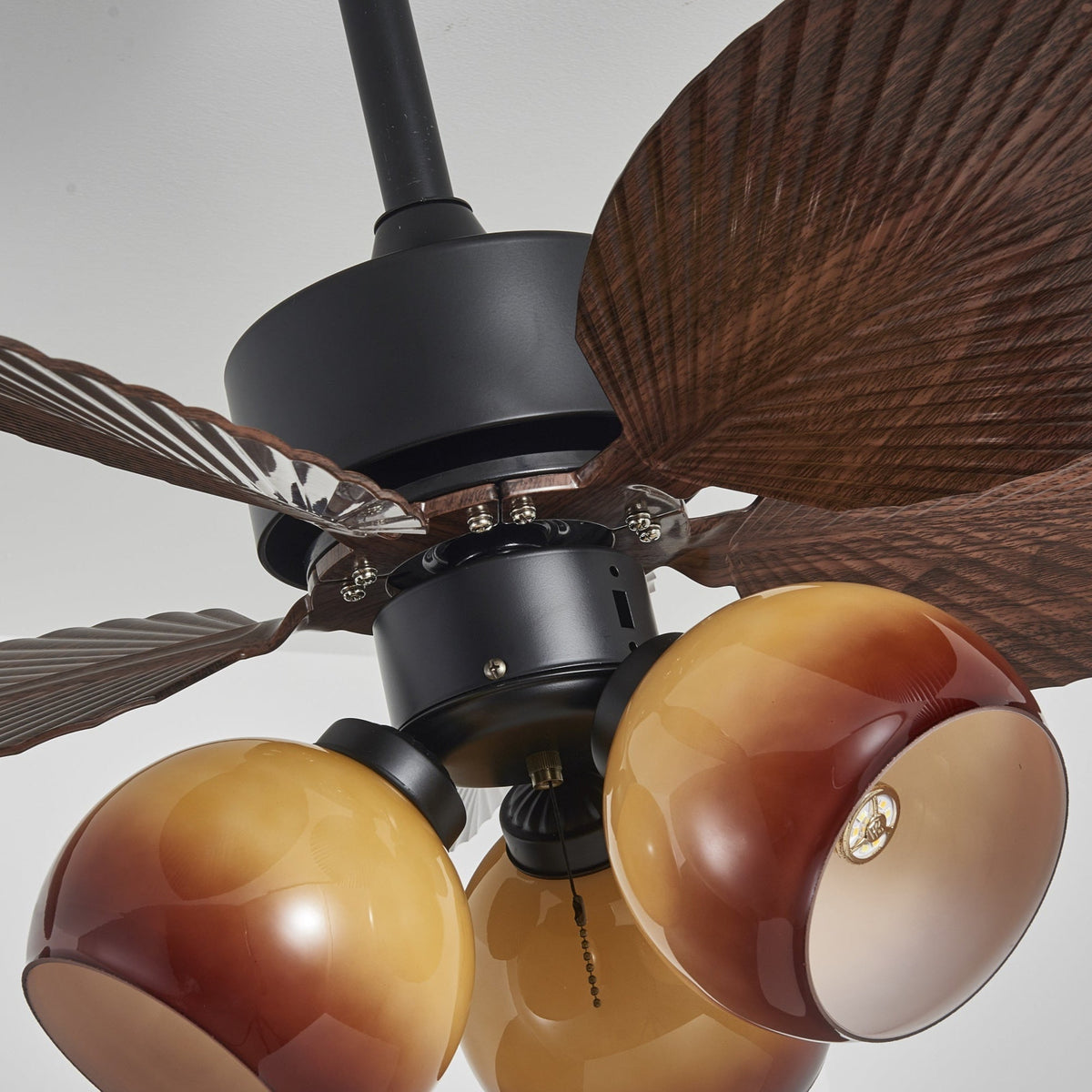 Tropiluxe Ceiling Fan Light with Palm Leaf Blades and Amber Glass Shade