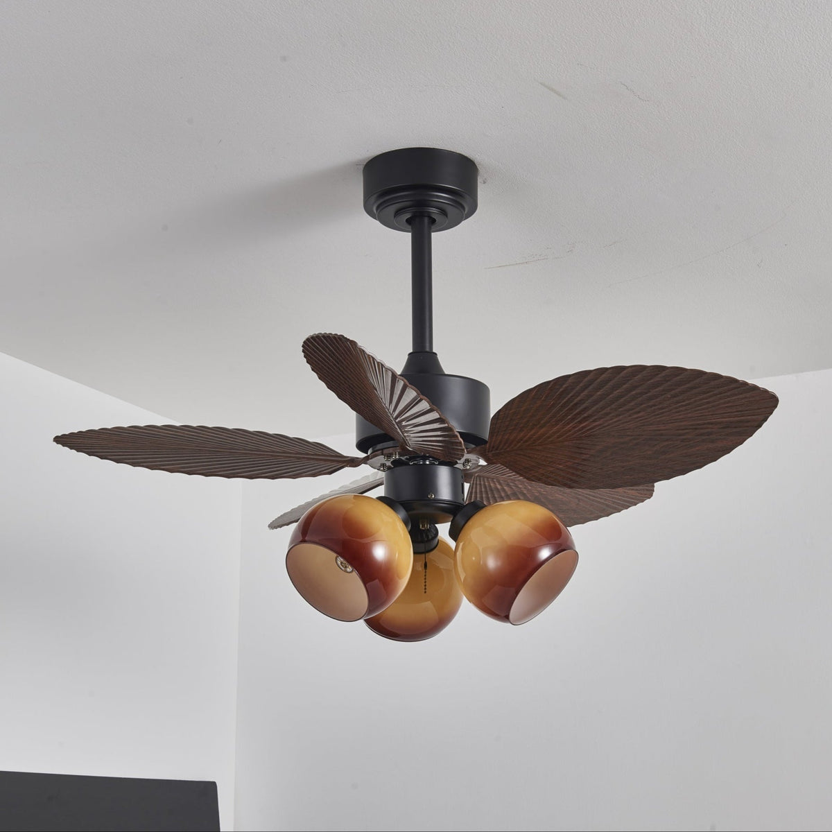 Tropiluxe Ceiling Fan Light with Palm Leaf Blades and Amber Glass Shade