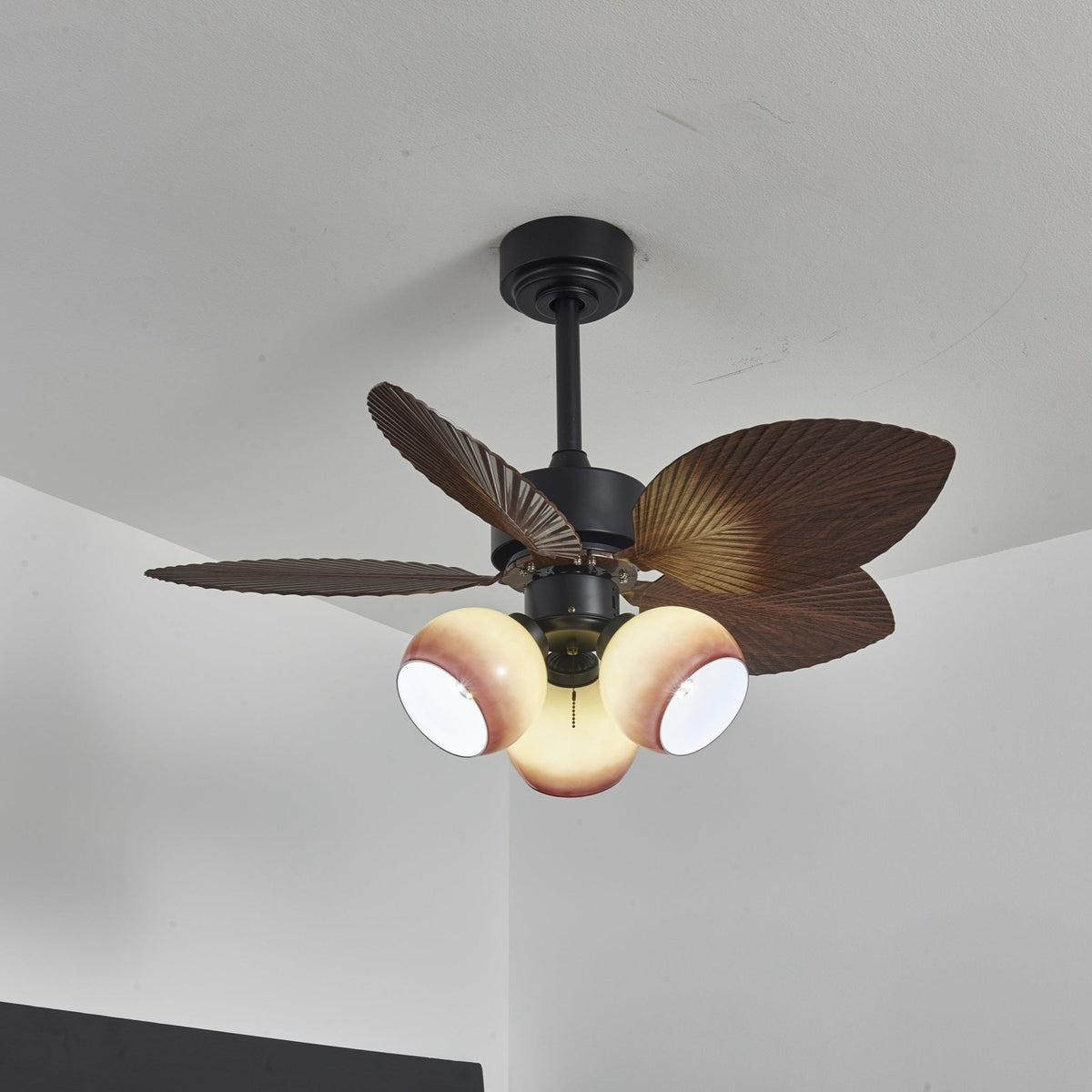 Tropiluxe Ceiling Fan Light with Palm Leaf Blades and Amber Glass Shade