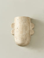 Vaelis Sculptural Travertine Wall Sconce for Modern Interiors