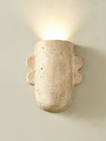 Vaelis Sculptural Travertine Wall Sconce for Modern Interiors