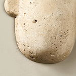Vaelis Sculptural Travertine Wall Sconce for Modern Interiors