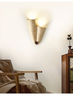 Velo Draped Stone Wall Sconce in Natural Travertine