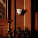 Velora Sculptural Wall Sconce in Matte Gold with Glass Shade