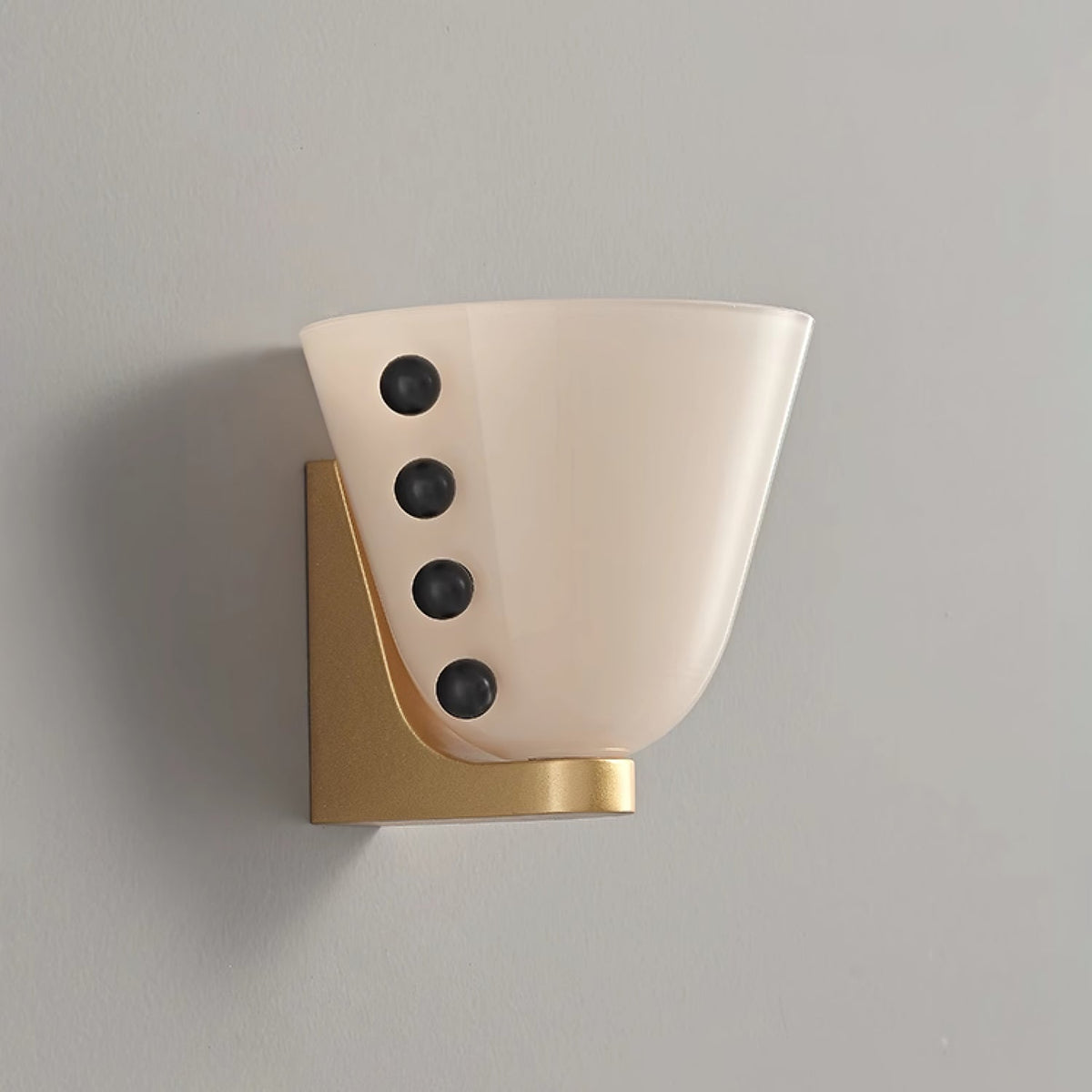 Velora Sculptural Wall Sconce in Matte Gold with Glass Shade