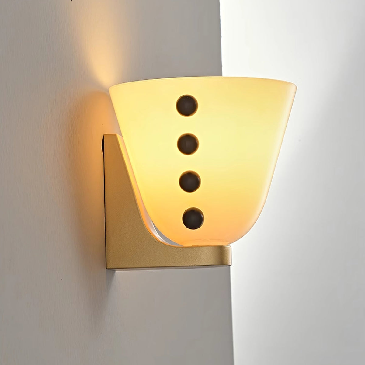 Velora Sculptural Wall Sconce in Matte Gold with Glass Shade