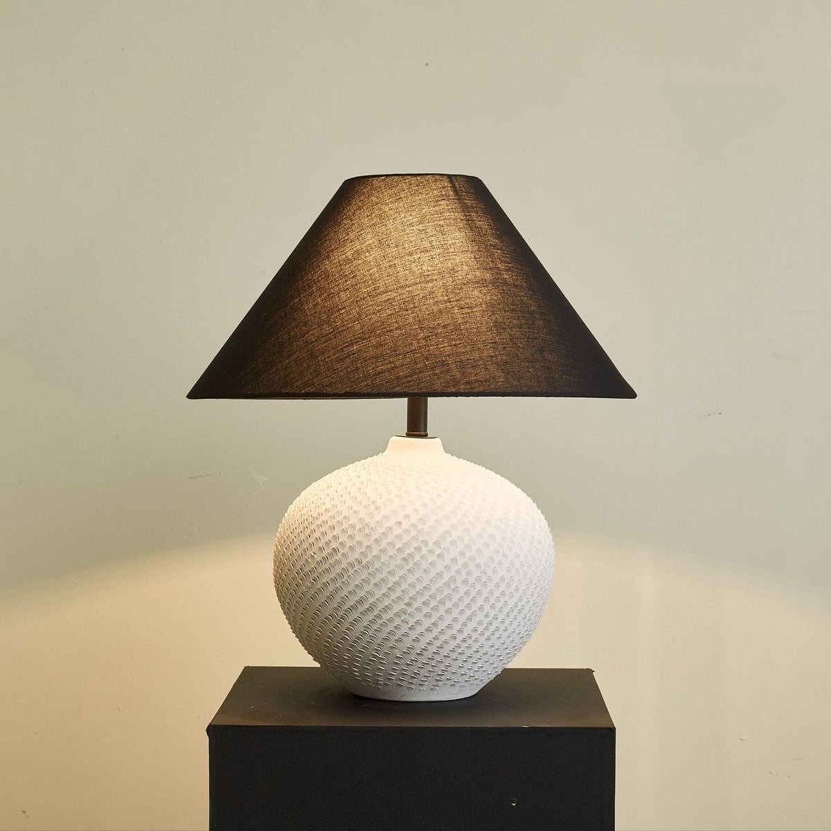 Velvra Sculpted Ceramic Table Lamp with Black Conical Shade