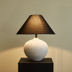 Velvra Sculpted Ceramic Table Lamp with Black Conical Shade