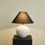 Velvra Sculpted Ceramic Table Lamp with Black Conical Shade