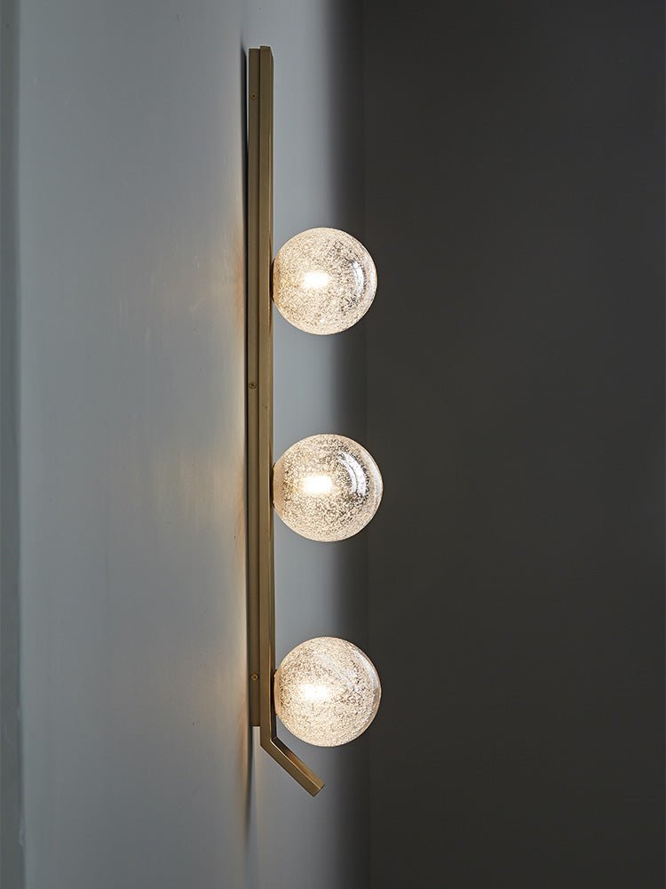Vertical Balls Bar Wall Sconce in Gold with Clear Glass Globes