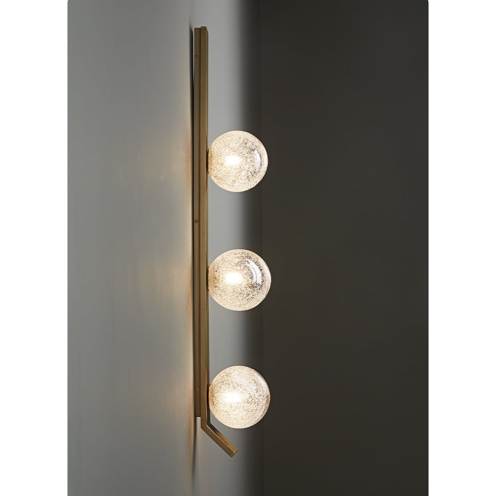 Vertical Balls Bar Wall Sconce in Gold with Clear Glass Globes