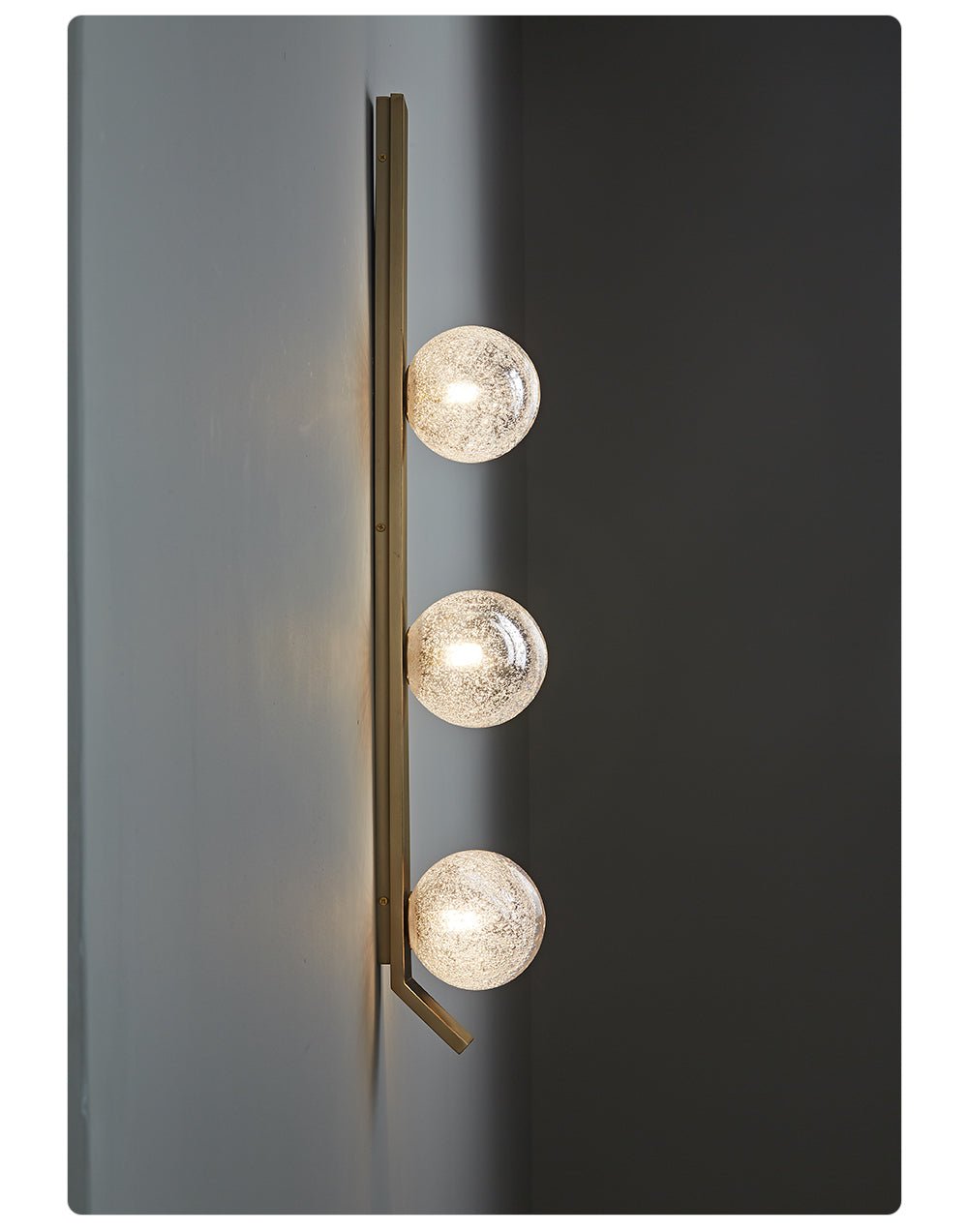 Vertical Balls Bar Wall Sconce in Gold with Clear Glass Globes