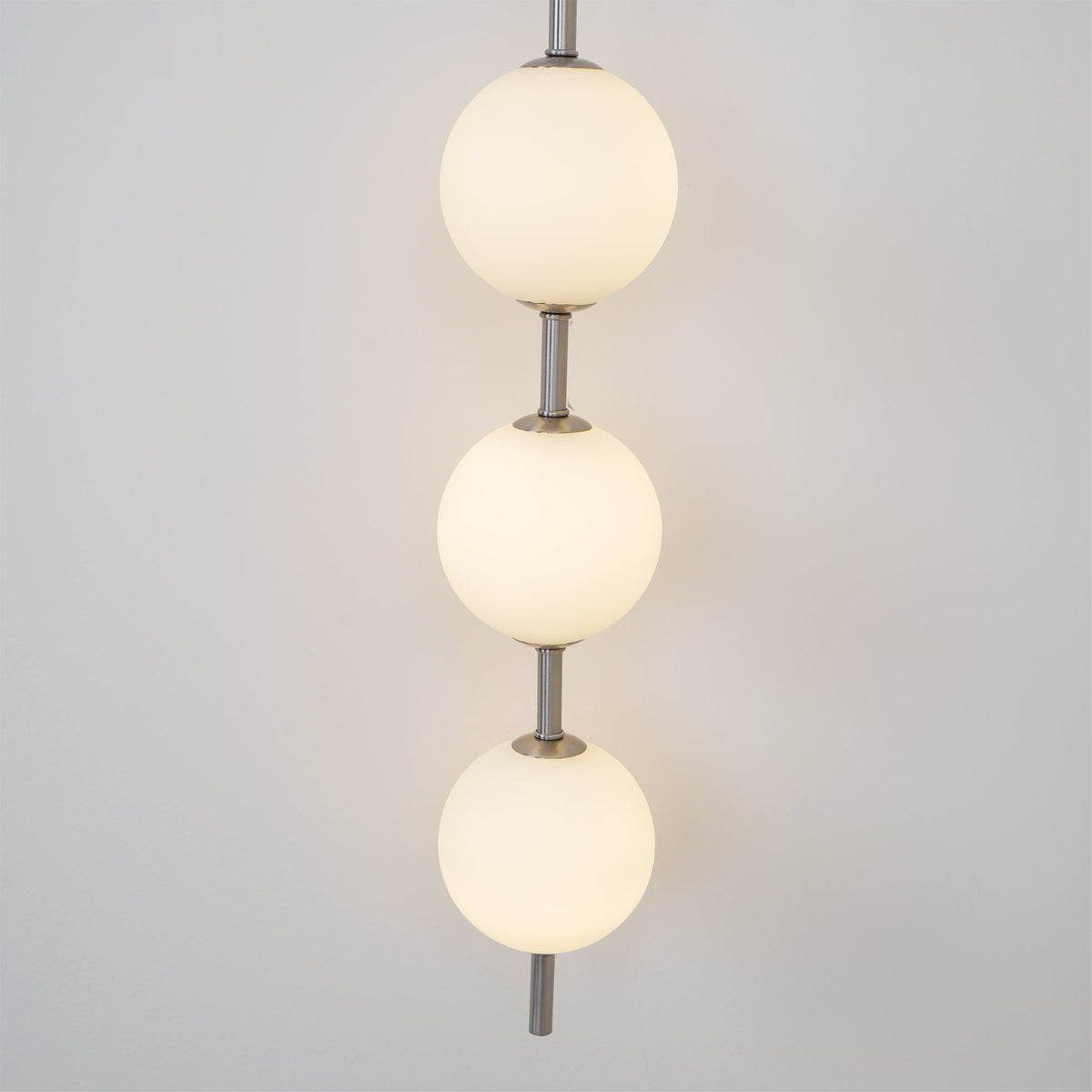 Vertical Globe Plug In Wall Lamp