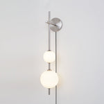 Vertical Globe Plug In Wall Lamp