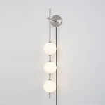 Vertical Globe Plug In Wall Lamp