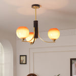 Caramel Globe Chandelier – Six-Light Brass & Glass Pendant for Dining and Living Spaces