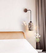 Volcanic Glow Travertine Wall Sconce with Walnut Accent