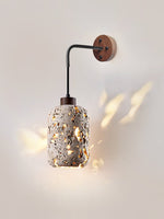 Volcanic Glow Travertine Wall Sconce with Walnut Accent